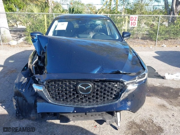 2022 Mazda CX-5 2.5 S Carbon Edition with VIN JM3KFBCM7N0619047, listed as a IAAI auction lot 41247709 with NaN miles. Bid and sale history available at carsss.com. Image 13.