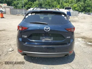 2018 Mazda CX-5 Grand Touring with VIN JM3KFBDM8J0342272, listed as a Copart auction lot 61930115 with 119,727 mi miles and Salvage title. Bid and sale history available at DreamBid. Image 6.