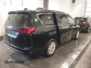 2022 Chrysler Pacifica Touring L with VIN 2C4RC1BG0NR170029, listed as a IAAI auction lot 41890660 with 88,121 mi miles and . Bid and sale history available at DreamBid. Image 4.
