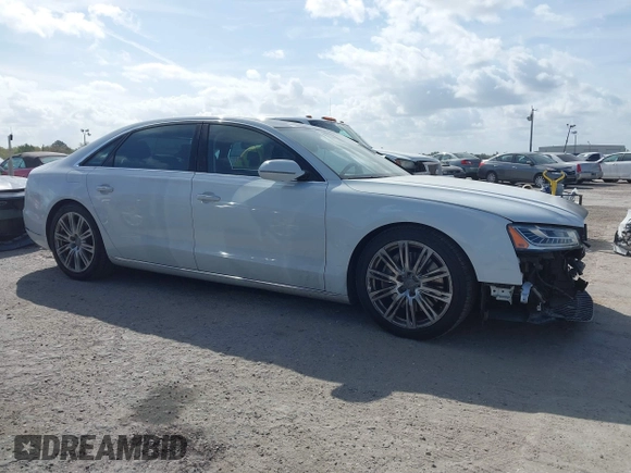 2015 Audi A8 L 4.0T with VIN WAU32AFD4FN002639, listed as a IAAI auction lot 41703951 with 103,722 mi miles. Bid and sale history available at carsss.com. Image 14.