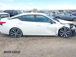 2020 Nissan Altima SR z VIN 1N4BL4CVXLC214582, wystawiony jako IAAI lot #40665527 z przebiegiem 90 224 mil mil oraz . Historia ofert i sprzedaży dostępna na DreamBid. Obrazek 13.