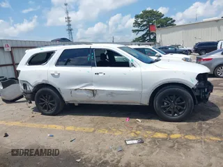 2015 Dodge Durango SXT with VIN 1C4RDHAG6FC145573, listed as a IAAI auction lot 42300420 with 134,684 mi miles and . Bid and sale history available at DreamBid. Image 14.