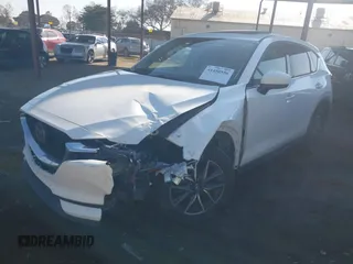 2017 Mazda CX-5 Grand Touring with VIN JM3KFBDL6H0164993, listed as a IAAI auction lot 41450556 with 97,733 mi miles. Bid and sale history available at carsss.com. Image 17.