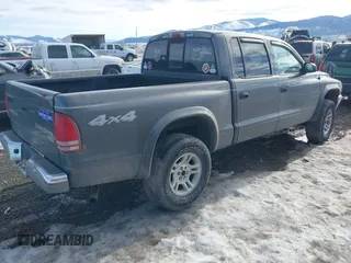 2004 Dodge Dakota SLT with VIN 1D7HG48N44S701906, listed as a IAAI auction lot 41662483 with 202,575 mi miles and . Bid and sale history available at carsss.com. Image 4.
