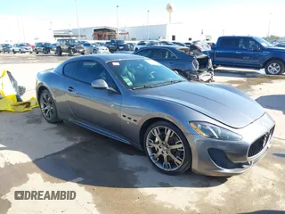 2013 Maserati GranTurismo Sport with VIN ZAM45VLA7D0074506, listed as a IAAI auction lot 41455462 with 34,292 mi miles. Bid and sale history available at carsss.com. Image 1.