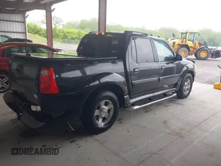 2004 Ford Explorer Sport Trac XLS z VIN 1FMZU77K94UA82414, wystawiony jako IAAI lot #42253012 z przebiegiem 202 018 mil mil oraz . Historia ofert i sprzedaży dostępna na DreamBid. Obrazek 4.