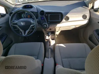 2010 Honda Insight EX with VIN JHMZE2H73AS039935, listed as a Copart auction lot 46192575 with 127,329 mi miles and Salvage Title. Bid and sale history available at DreamBid. Image 8.