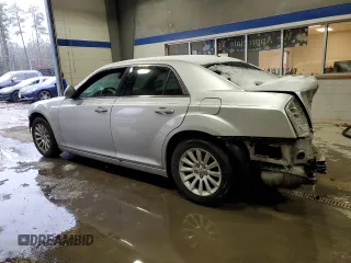 2012 Chrysler 300 with VIN 2C3CCAAG7CH117018, listed as a Copart auction lot 48672635 with 195,880 mi miles and Salvage Title. Bid and sale history available at carsss.com. Image 2.