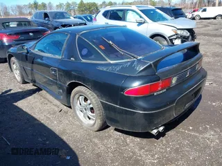 1999 Mitsubishi 3000GT GT z VIN JA3AM84JXXY001953, wystawiony jako IAAI lot #41834925 z przebiegiem 132 335 mil mil oraz . Historia ofert i sprzedaży dostępna na DreamBid. Obrazek 3.