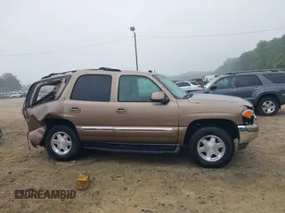 2004 GMC Yukon SLT z VIN 1GKEK13Z44R121720, wystawiony jako IAAI lot #42222492 z przebiegiem 263 216 mil mil oraz . Historia ofert i sprzedaży dostępna na DreamBid. Obrazek 12.