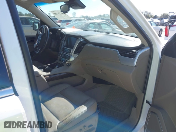 2019 GMC Yukon SLT with VIN 1GKS1BKC9KR332014, listed as a IAAI auction lot 40674460 with 76,545 mi miles. Bid and sale history available at carsss.com. Image 5.