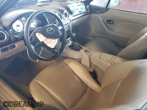 2003 Mazda MX-5 Miata Cloth with VIN JM1NB353730303334, listed as a Copart auction lot 51692615 with 142,789 mi miles and Salvage title. Bid and sale history available at DreamBid. Image 8.