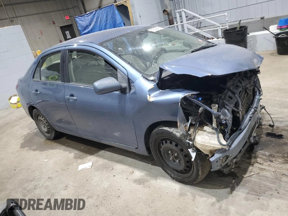 2009 Toyota Yaris with VIN JTDBT903094047243, listed as a Copart auction lot 47296455 with 235,483 mi miles and Salvage Title. Bid and sale history available at DreamBid. Image 4.