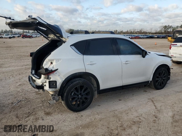 2024 Mazda CX-5 2.5 Carbon Turbo with VIN JM3KFBAY8R0443122, listed as a Copart auction lot 48023315 with 9,586 mi miles and Salvage Title. Bid and sale history available at carsss.com. Image 3.
