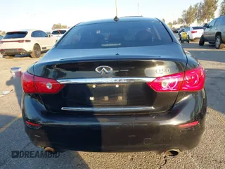 2015 Infiniti Q50 Premium z VIN JN1BV7AP5FM346323, wystawiony jako IAAI lot #41305093 z przebiegiem 112 556 mil mil oraz . Historia ofert i sprzedaży dostępna na DreamBid. Obrazek 16.
