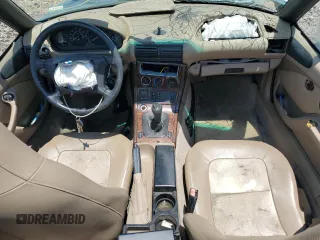 1998 BMW 3 Series Z3 2.8 z VIN 4USCJ3337WLC15638, wystawiony jako Copart lot #59053655 z przebiegiem 128 978 mil mil oraz Szkoda całkowita • Salvage title. Historia ofert i sprzedaży dostępna na DreamBid. Obrazek 8.