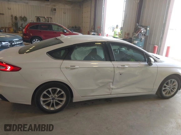 2020 Ford Fusion SE with VIN 3FA6P0HD4LR165511, listed as a IAAI auction lot 42136252 with 30,709 mi miles and . Bid and sale history available at DreamBid. Image 6.