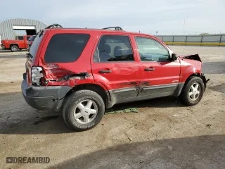 2002 Ford Escape XLS Value with VIN 1FMYU01B82KC15443, listed as a Copart auction lot 77998164 with 212,313 mi miles and Salvage Title. Bid and sale history available at carsss.com. Image 3.