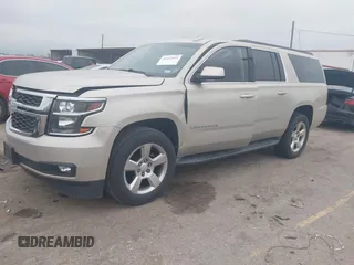 2015 Chevrolet Suburban LT with VIN 1GNSCJKC4FR744208, listed as a IAAI auction lot 41612915 with 87,445 mi miles and . Bid and sale history available at DreamBid. Image 17.