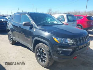 2019 Jeep Compass Trailhawk with VIN 3C4NJDDB1KT671642, listed as a IAAI auction lot 41810138 with 119,029 mi miles and . Bid and sale history available at carsss.com. Image 1.