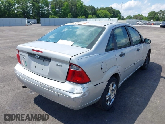 2006 Ford Focus S z VIN 1FAFP34N66W203290, wystawiony jako IAAI lot #42273443 z przebiegiem 193 482 mil mil oraz . Historia ofert i sprzedaży dostępna na DreamBid. Obrazek 4.