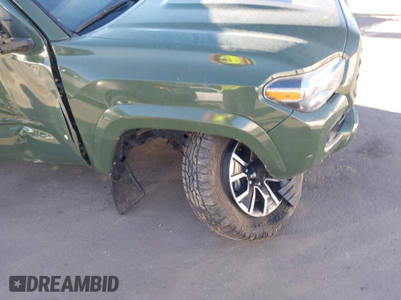 2021 Toyota Tacoma SR with VIN 3TYCZ5AN2MT039450, listed as a IAAI auction lot 40457613 with 54,176 mi miles and . Bid and sale history available at DreamBid. Image 6.