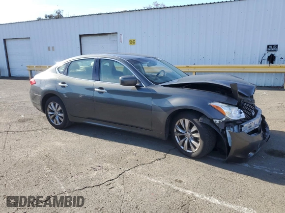 2012 Infiniti M37 with VIN JN1BY1AP8CM333839, listed as a Copart auction lot 84052134 with 121,979 mi miles and Salvage Title. Bid and sale history available at carsss.com. Image 4.