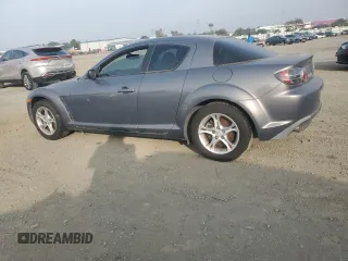 2006 Mazda RX-8 with VIN JM1FE173X60205870, listed as a Copart auction lot 87131664 with 82,990 mi miles and Salvage Title. Bid and sale history available at carsss.com. Image 2.