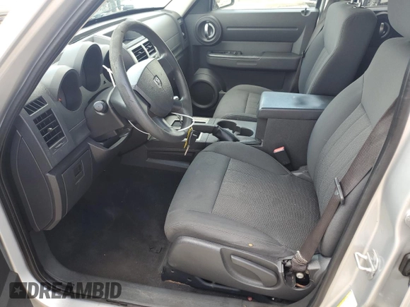 2011 Dodge Nitro Heat with VIN 1D4PU4GK0BW604975, listed as a Copart auction lot 56979275 with 160,494 mi miles and Salvage title. Bid and sale history available at DreamBid. Image 7.