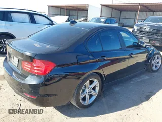2015 BMW 3 Series 328i with VIN WBA3C1C57FK120647, listed as a IAAI auction lot 41699476 with 84,933 mi miles and . Bid and sale history available at DreamBid. Image 4.