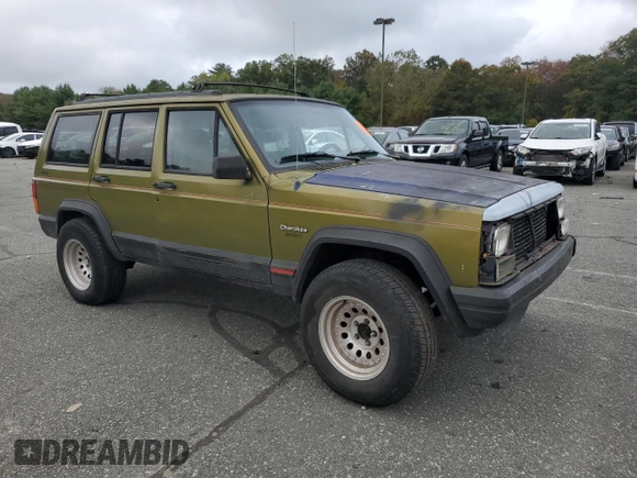 1996 Jeep Cherokee Sport with VIN 1J4FJ68S9TL291661, listed as a Copart auction lot 71968934 with 139,695 mi miles and Salvage Title. Bid and sale history available at carsss.com. Image 4.