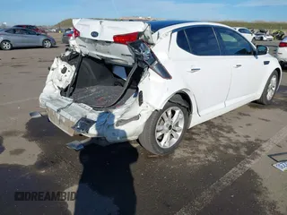 2011 Kia Optima EX with VIN KNAGN4A60B5163017, listed as a IAAI auction lot 41277968 with 185,012 mi miles and . Bid and sale history available at carsss.com. Image 4.
