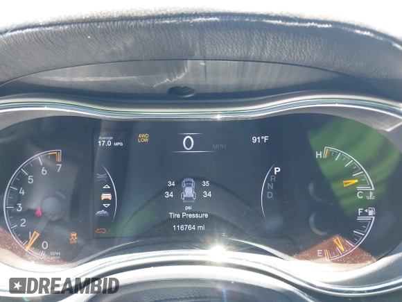 2017 Jeep Grand Cherokee Overland with VIN 1C4RJFCG2HC641791, listed as a IAAI auction lot 42566654 with 116,764 mi miles and . Bid and sale history available at DreamBid. Image 7.