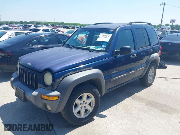 2004 Jeep Liberty Sport with VIN 1J4GK48KX4W241129, listed as a IAAI auction lot 41980258 with 259,048 mi miles and . Bid and sale history available at DreamBid. Image 2.