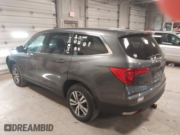 2016 Honda Pilot EX-L with VIN 5FNYF6H51GB097323, listed as a IAAI auction lot 41989978 with 105,006 mi miles. Bid and sale history available at carsss.com. Image 3.