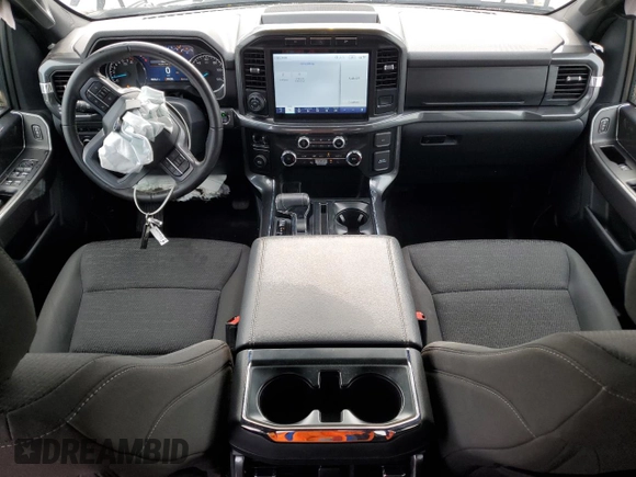 2023 Ford F-150 XL with VIN 1FTEW1C59PFC27499, listed as a Copart auction lot 54453255 with 58,554 mi miles and Salvage title. Bid and sale history available at DreamBid. Image 8.
