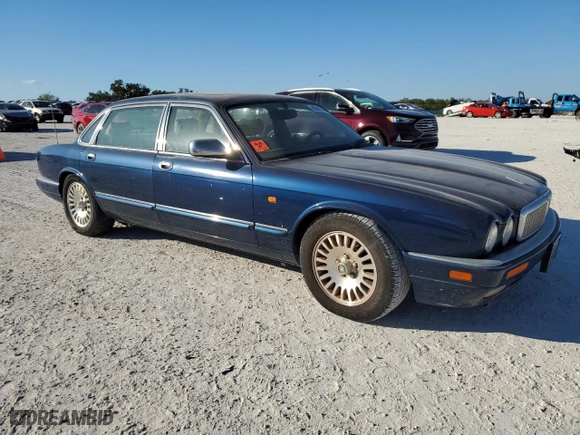 1997 Jaguar XJ Series Sedan Vanden Plas with VIN SAJKX6244VC801688, listed as a Copart auction lot 80841864 with NaN miles and Salvage Title. Bid and sale history available at carsss.com. Image 4.