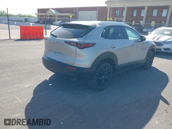 2024 Mazda CX-30 2.5 S Select Sport with VIN 3MVDMBBM4RM689518, listed as a IAAI auction lot 42021872 with 5,041 mi miles. Bid and sale history available at carsss.com. Image 4.