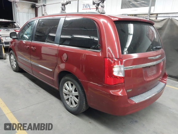 2013 Chrysler Town & Country Touring with VIN 2C4RC1BG3DR792929, listed as a IAAI auction lot 42185342 with Not Provided miles and . Bid and sale history available at DreamBid. Image 3.