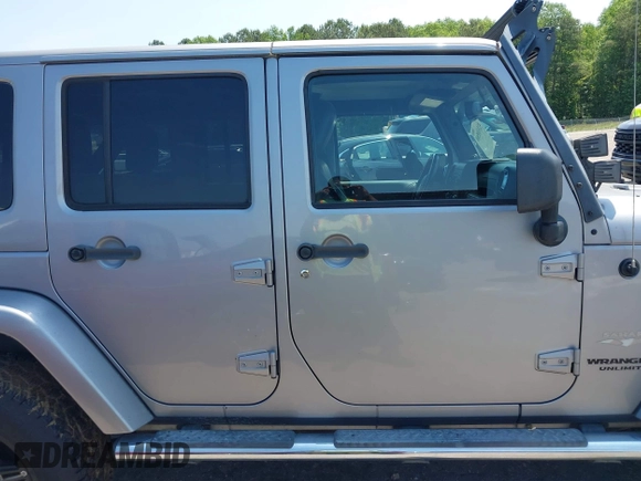 2013 Jeep Wrangler Unlimited Sahara with VIN 1C4BJWEG4DL666930, listed as a IAAI auction lot 42310569 with 206,577 mi miles and . Bid and sale history available at DreamBid. Image 13.
