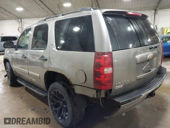 2009 Chevrolet Tahoe LTZ with VIN 1GNFK33049R143390, listed as a IAAI auction lot 41747041 with 209,492 mi miles and . Bid and sale history available at DreamBid. Image 3.