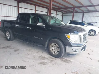 2018 Nissan Titan SV with VIN 1N6AA1E63JN512230, listed as a IAAI auction lot 42000705 with 64,479 mi miles and . Bid and sale history available at DreamBid. Image 1.