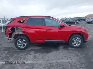 2022 Hyundai Tucson SEL z VIN 5NMJBCAE6NH036051, wystawiony jako IAAI lot #42257485 z przebiegiem 36 642 mil mil oraz . Historia ofert i sprzedaży dostępna na DreamBid. Obrazek 14.