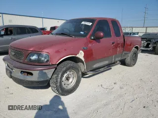 1997 Ford F-150 XL with VIN 1FTDX0721VKC14947, listed as a Copart auction lot 74887414 with 157,811 mi miles and Salvage title. Bid and sale history available at DreamBid. Image 1.