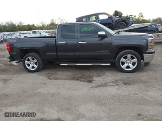 2015 Chevrolet Silverado 1500 LS with VIN 1GCVKPECXFZ436354, listed as a IAAI auction lot 41891065 with 128,164 mi miles. Bid and sale history available at carsss.com. Image 13.