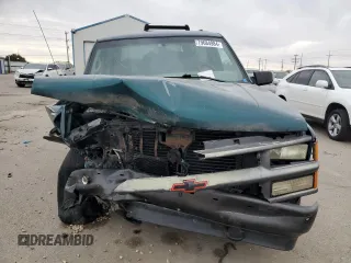 1998 Chevrolet Tahoe z VIN 3GNEK18R4WG128424, wystawiony jako Copart lot #79684984 z przebiegiem 217 456 mil mil oraz Szkoda całkowita • Salvage title. Historia ofert i sprzedaży dostępna na DreamBid. Obrazek 5.