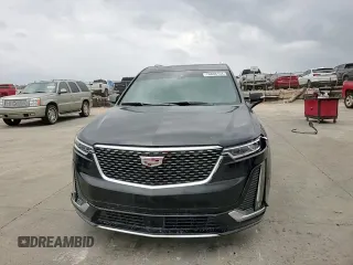2021 Cadillac XT6 Premium Luxury z VIN 1GYKPERS0MZ181151, wystawiony jako Copart lot #78808104 z przebiegiem 31 697 mil mil oraz Szkoda całkowita • Salvage title. Historia ofert i sprzedaży dostępna na DreamBid. Obrazek 12.