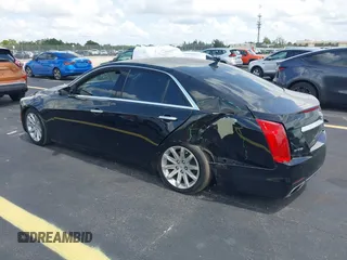 2014 Cadillac CTS RWD with VIN 1G6AP5SX0E0185913, listed as a IAAI auction lot 42685622 with 107,406 mi miles and . Bid and sale history available at DreamBid. Image 3.