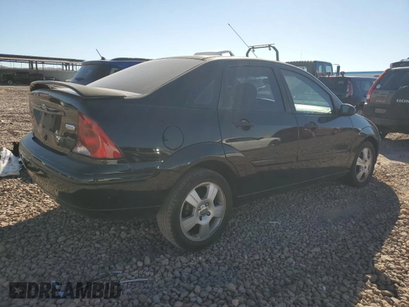 2003 Ford Focus ZTS with VIN 1FAFP38333W249101, listed as a Copart auction lot 77824534 with 163,513 mi miles and Salvage Title. Bid and sale history available at carsss.com. Image 3.