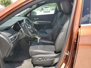 2019 Cadillac XT4 FWD Premium Luxury with VIN 1GYFZCR41KF183507, listed as a Copart auction lot 61581215 with 64,803 mi miles and Salvage title. Bid and sale history available at DreamBid. Image 7.